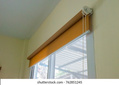 Roll Blinds With Yellow Sunscreen.
