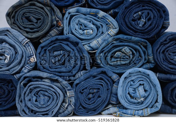 Roll Blue Denim Jeans Arranged Stackgray Stock Photo (Edit Now) 519361828
