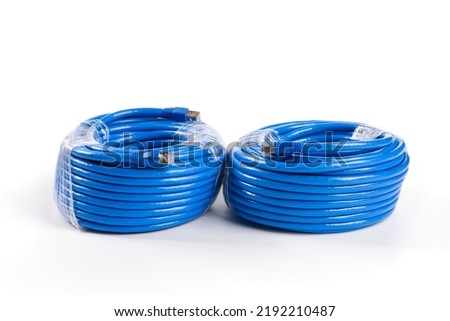 roll of blue network cable isolated on white background