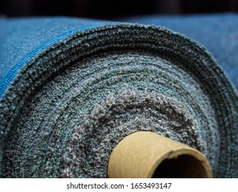 A Roll Of Denim Fabric. Woven Factory Or Warehouse.