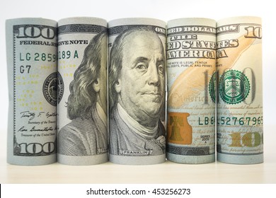 Roll Dollar Banknotes. Dollar Currency Money. Banknotes Stacked On Each Other In Different Positions. American Dollar. US Dollar. Bill Cash Federal Money Papers Position Currency Exchange Concept