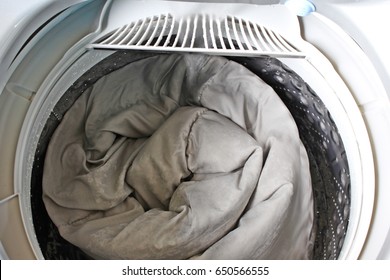 Roll Up The Duvet Put In A Washing Machine.