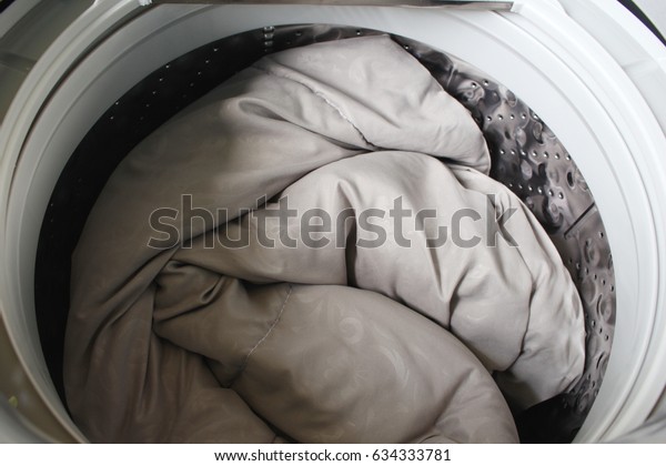 Roll Duvet Put Washing Machine Stock Photo Edit Now 634333781