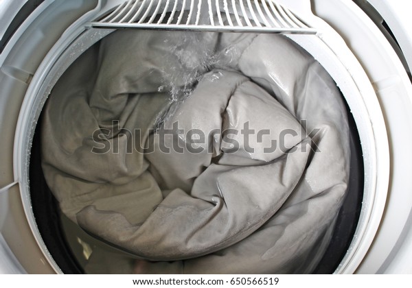 Roll Duvet Put Washing Machine Stock Photo Edit Now 650566519