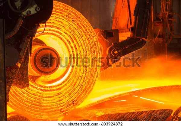 Roll of hot metal on\
the conveyor belt