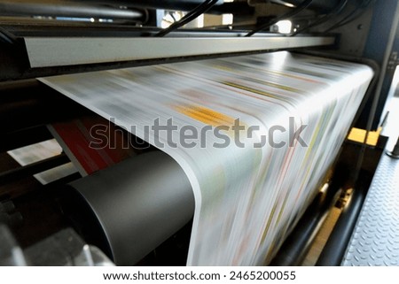 roll offset print machine in a large print shop for production of newspapers and magazines 