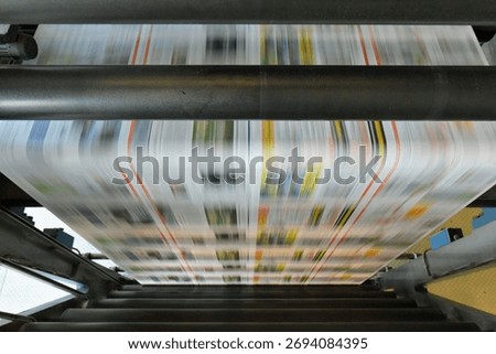 roll offset print machine in a large print shop for production of newspapers and magazines 
