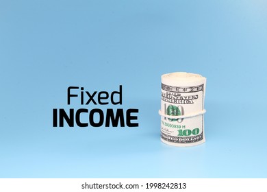 A Roll Of Paper Money With The Word Fixed Income