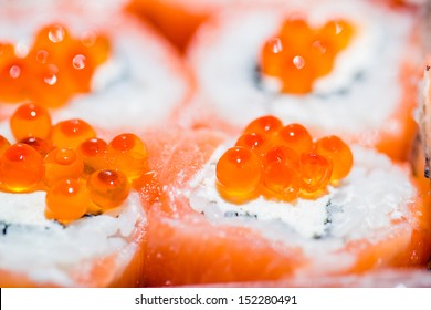 Roll Philadelphia with red caviar close up - Powered by Shutterstock