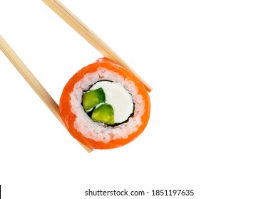 Roll Philadelphia with salmon. Japanese sushi with chopsticks. roll Philadelphia sushi with cream cheese and avocado on sticks isolated on a white background