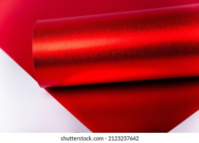 Roll Of Red Shiny Paper For Creativity. Isolon For Flowers. Soft Material For Handmade