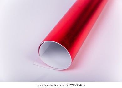 Roll Of Red Shiny Paper For Creativity. Isolon For Flowers. Soft Material For Handmade