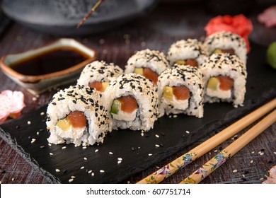 Roll with salmon, avocado, cucumber. Sushi menu. Japanese food. 