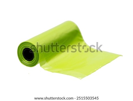 Roll of small plastic garbage bags or environmentally friendly poop bags. Isolated on white.