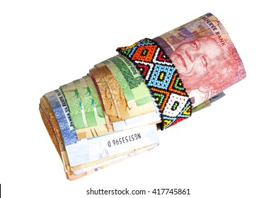 Roll Of South African Banknotes Secured With Band Of Zulu Beads