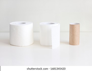 Roll Of Toilet Paper And Empty Toilet Roll