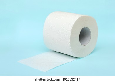 Roll Of White Toilet Paper On Blue Background