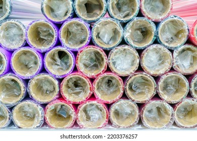 A Roll Of Wrapping Paper On A Shelf In A Store.