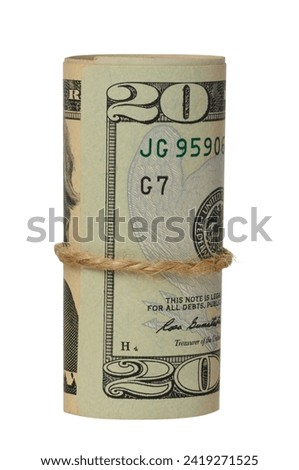 Rolled American dollar twenty dollar bills on isolated background
