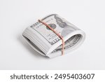 Rolled American dollars banknotes. Bundle of money roll of dollars isolated on white background, with clipping path.