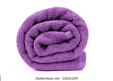 Rolled Up Beach Towel On White Background