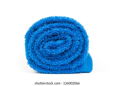 Rolled Up Blue Towel Isolated On White