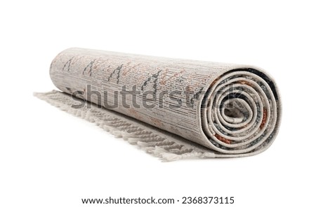 Rolled carpet on white background. Interior element