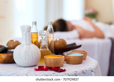 Rolled, compress balls, bottle oil, salt, towels, bowl, stone and candlelight. Treatment therapy spa thai and cleaning body. concept of beauty salon spa.