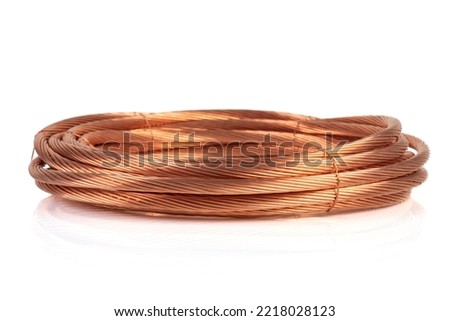 Rolled up copper cable wire isolated on white background
