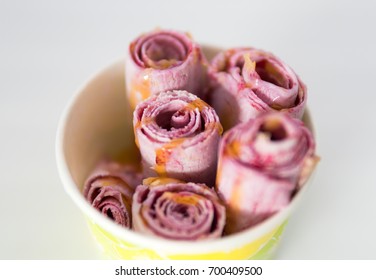 Rolled fruit ice cream isolated. Closeup view