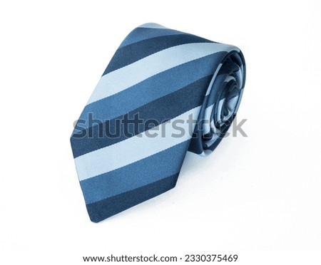 Rolled up men's necktie shop item concept. Mens necktie isolated on white.