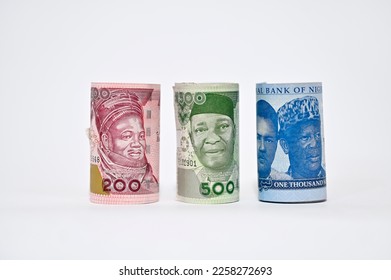 Rolled up Naira notes isolated on white background. Rolled up Naira