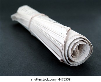 Rolled Up Newspaper