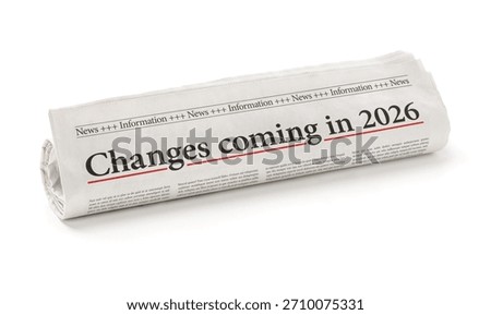 Rolled newspaper with the headline Changes coming in 2026