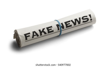 Rolled Up Newspaper with Headline of Fake News Isolated on White Background.