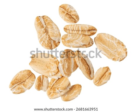 Rolled Oat flakes  explosion. Levitating oatflakes shattering isolated on white background. Falling oats and crumbs 
