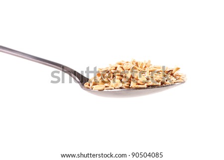 rolled oats in spoon