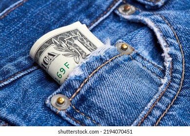 Rolled Up One Dollar Bills In Jeans Pocket