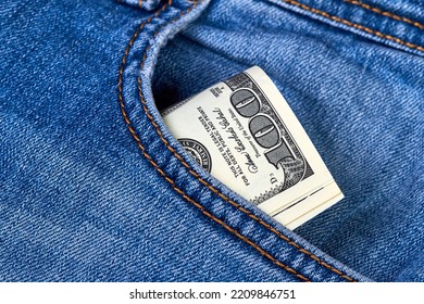 Rolled Up One Hundred Dollar Bills In Jeans Pocket