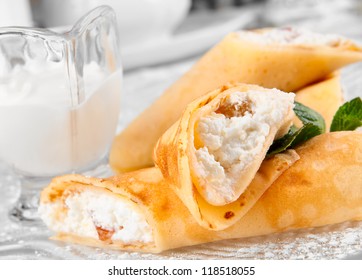 Rolled Pancakes With Cottage Cheese And Raisins