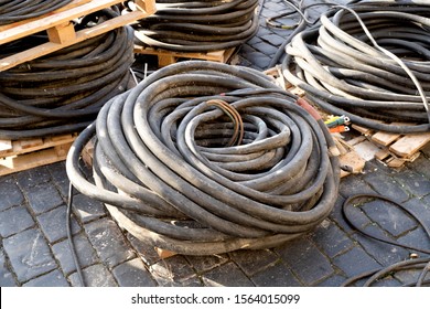 Rolled power cable on brick