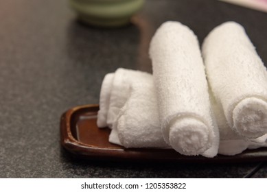 Rolled Set Of Oshibori Is A Hot Or Cold Towel Served In Japanese Restaurant, Selective Focus