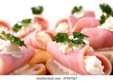 Rolled slices of ham filled with horseradish cream
