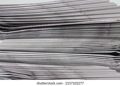 Rolled Up Stack Of Fresh Newspapers, News, Printed Background