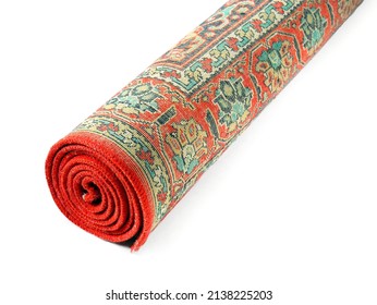 Rolled vintage carpet on white background, closeup