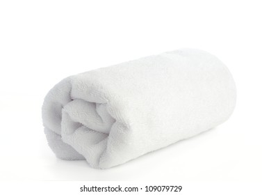 Rolled Up White Beach Towel On  White Background