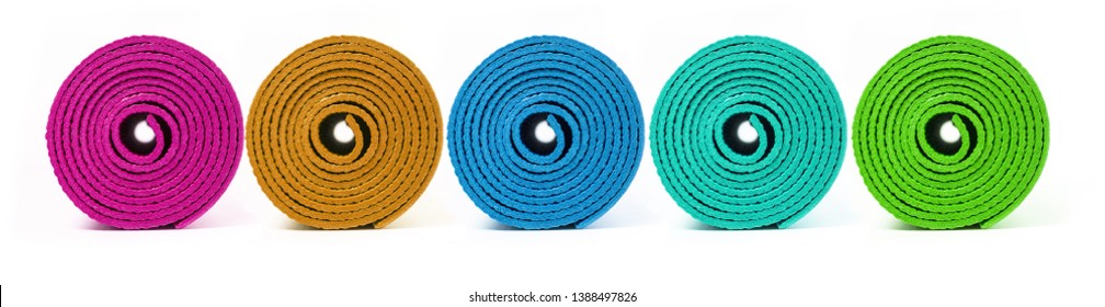 Rolled Up  Yoga Mat Isolated On White