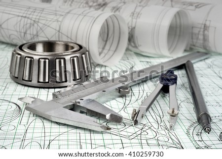 roller bearing, vernier callipers , compasses, technical pen and drawings 