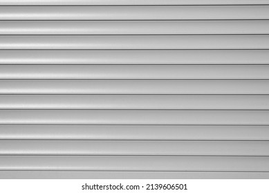 Roller Blinds, Gray Horizontal Metal Roller Shutters, Close-up.