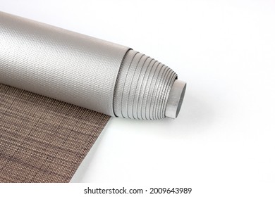 Roller blinds are made from texture material. Color blackout roller blind.